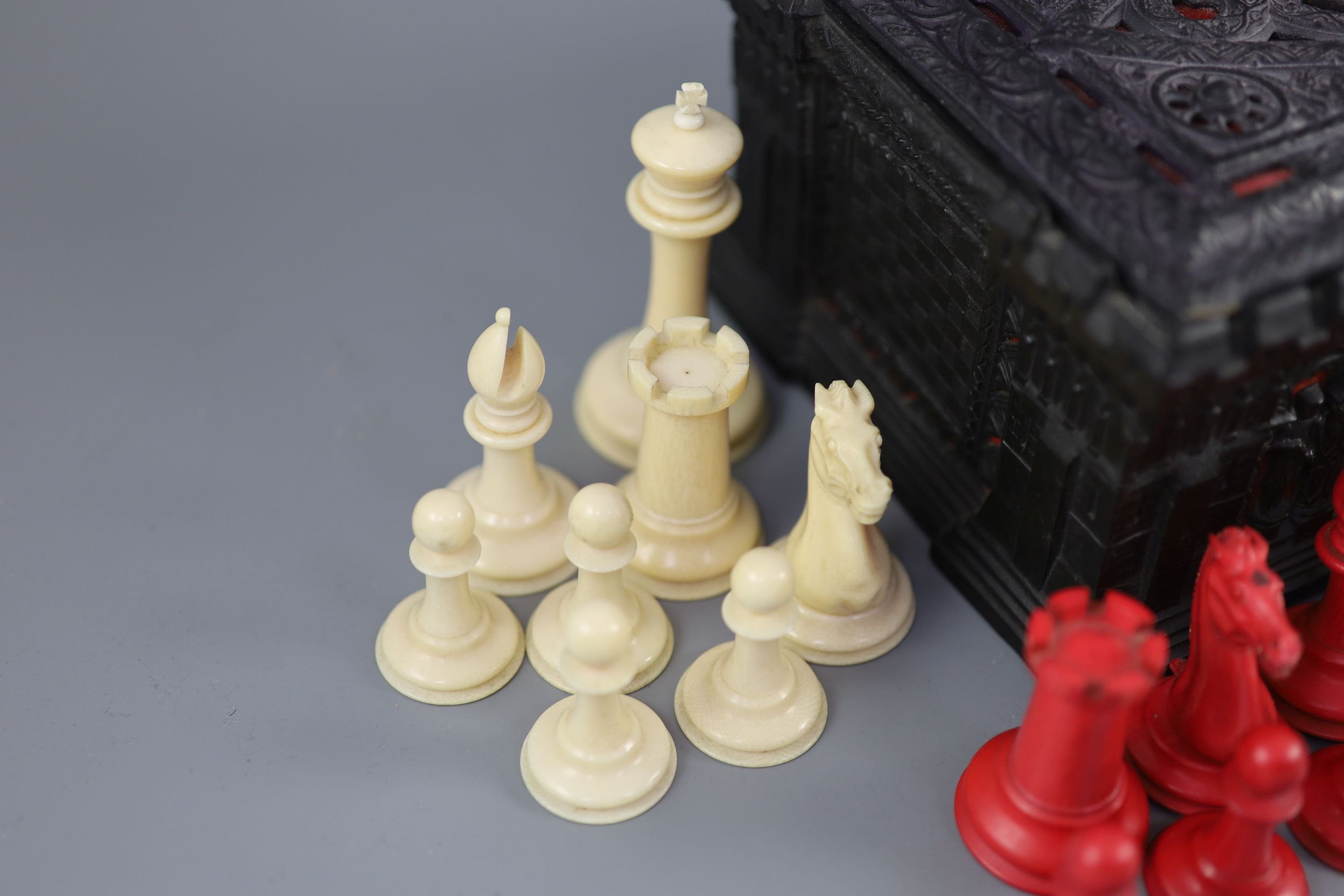 A Jaques London red and white ivory 3 1/2 Staunton chess set, c.1850, 8.25 x 6 x 4in.